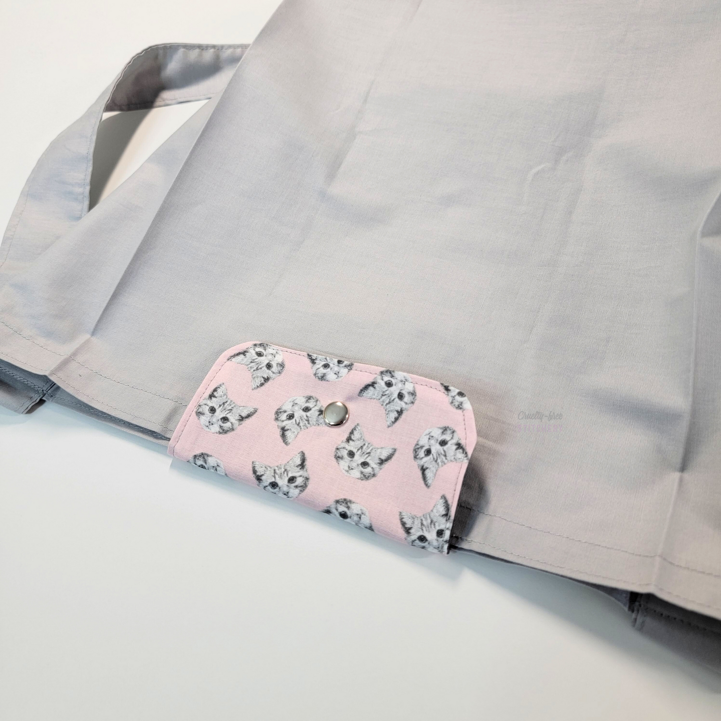 The flap also snaps to the top of the bag to close it while in use.