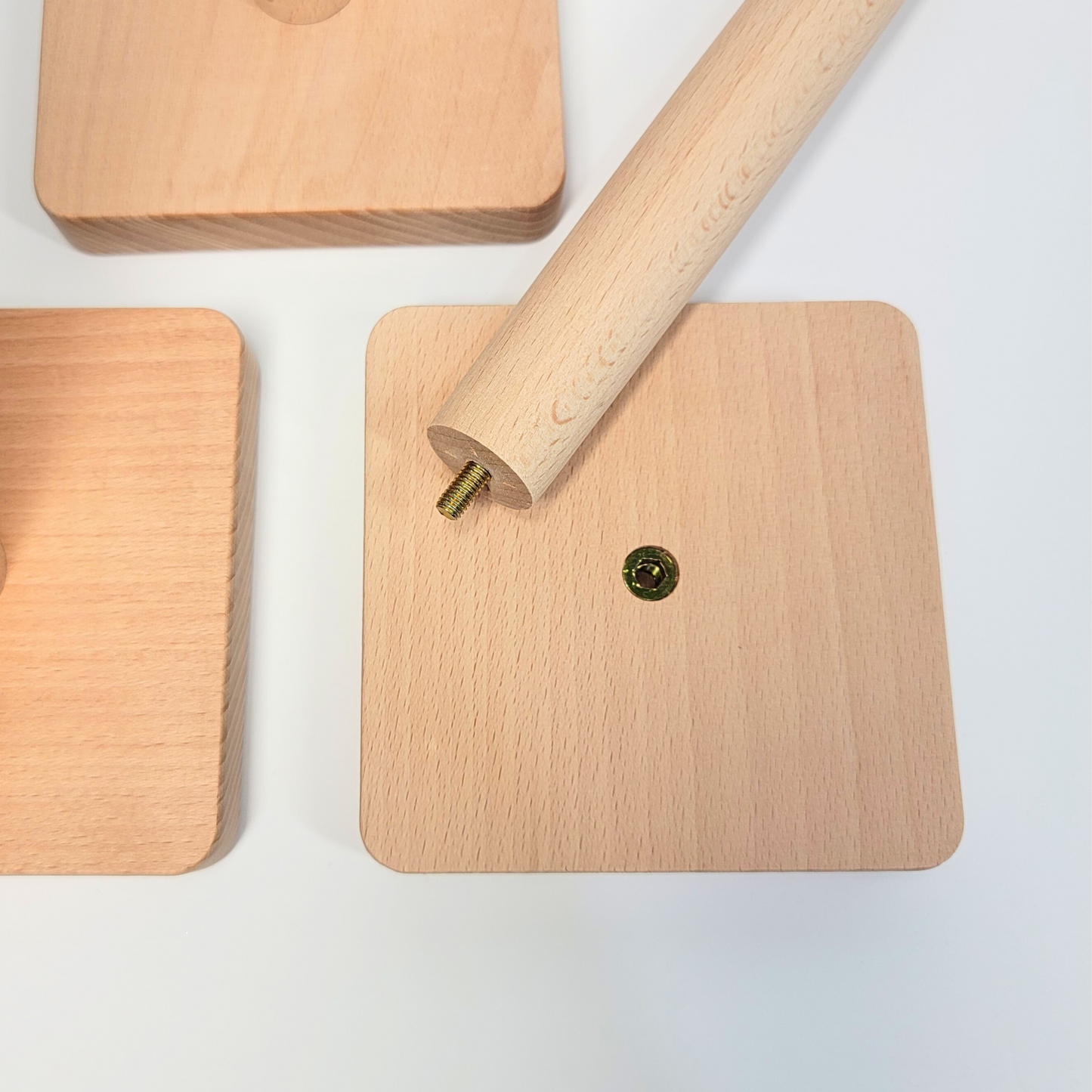 A close-up of the NonPaper Towel holder base with the dowel unscrewed.