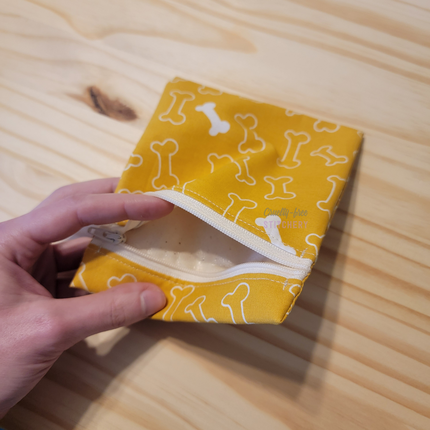 Inside of the small zipper snack bag, showing the lining.