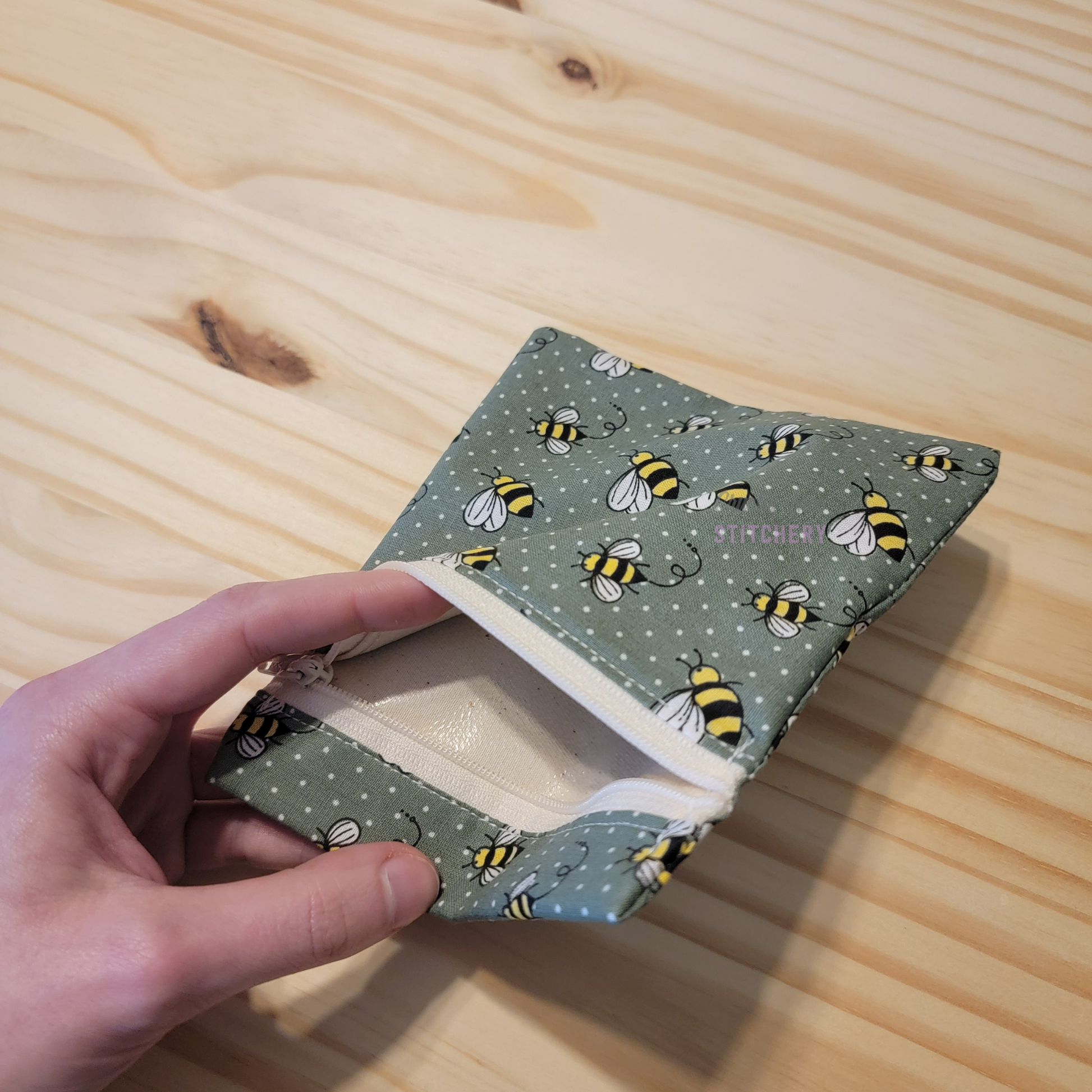 Inside of the small zipper snack bag, showing the lining.