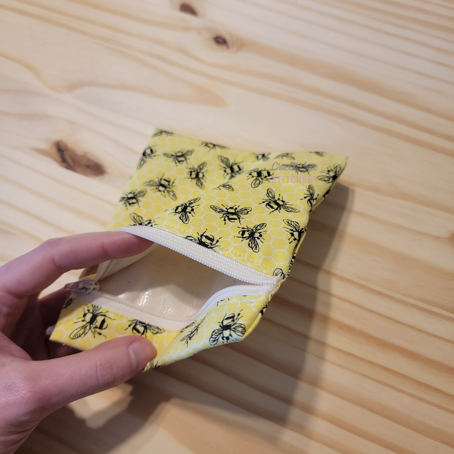 Inside of the small zipper snack bag, showing the lining.