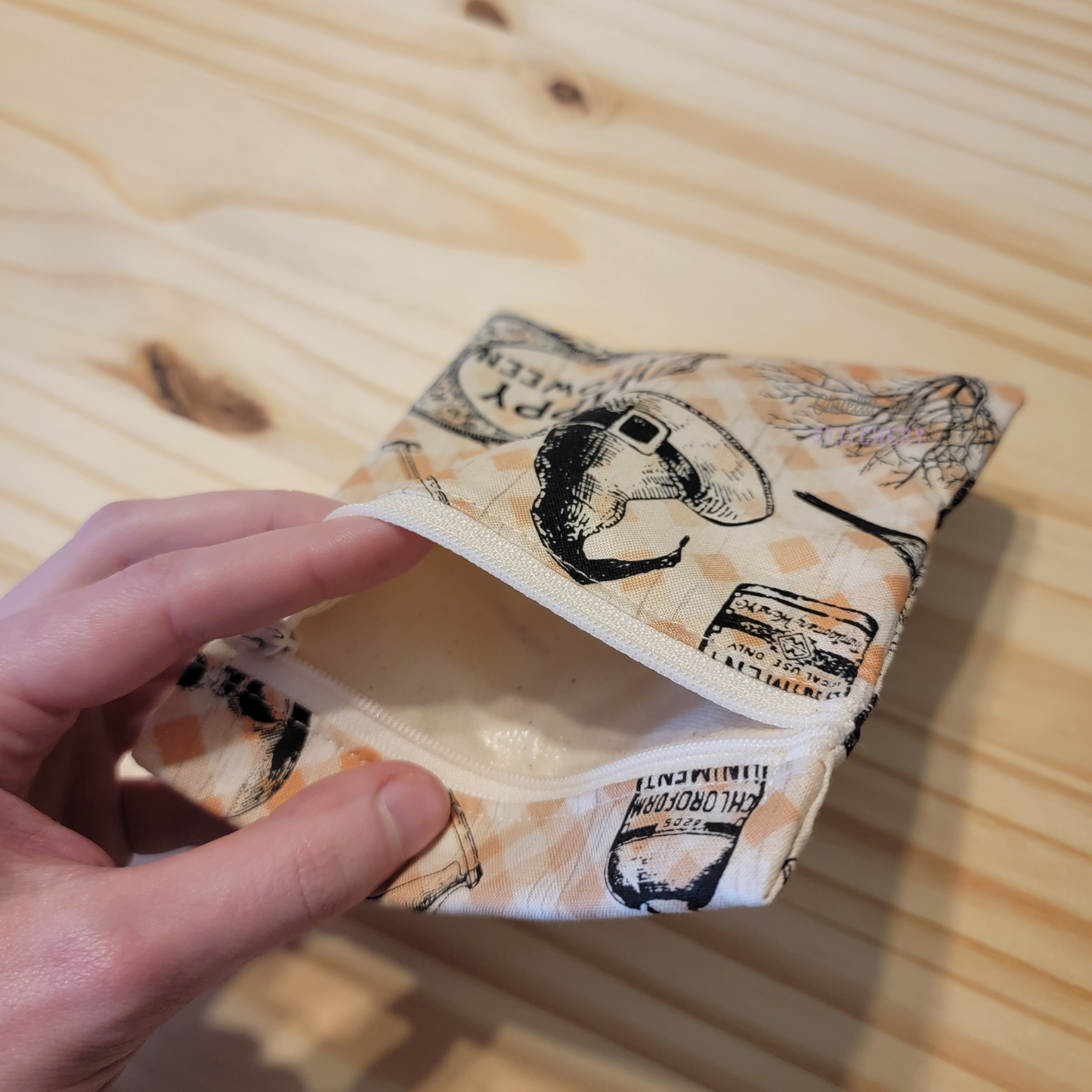 Inside of the small zipper snack bag, showing the lining.