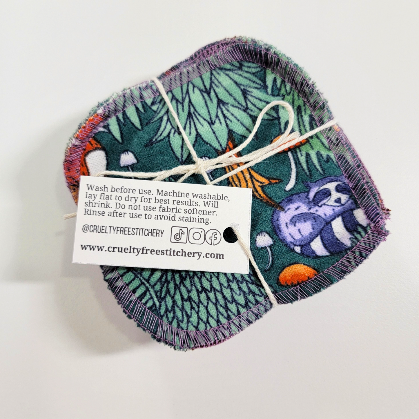 The back of the small white tag with care instructions.
