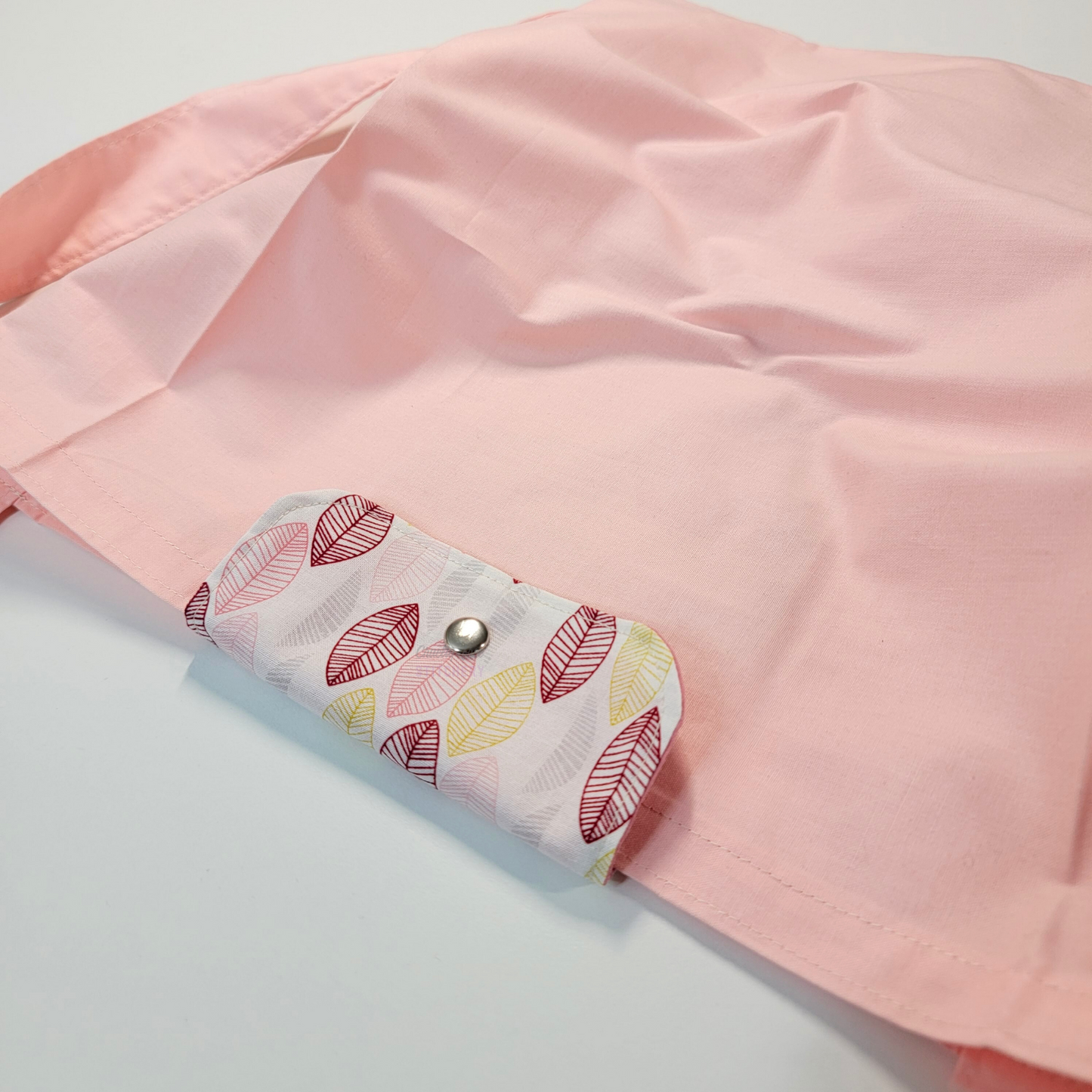 The flap also snaps to the top of the bag to close it while in use.