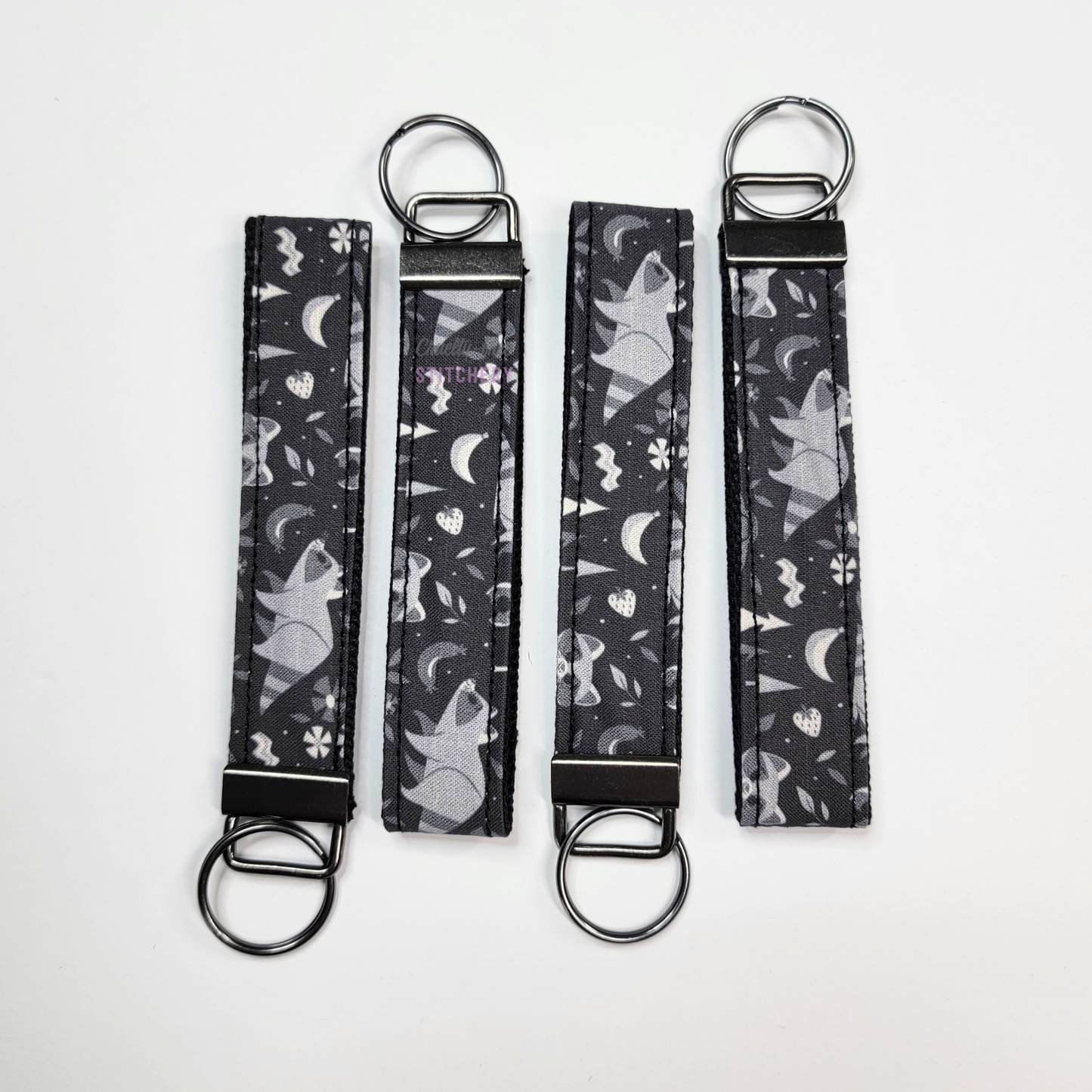 Wristlets arranged in a row to show each may be slightly different due to placement of the fabric.
