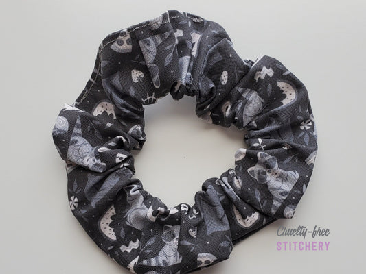 Raccoons print scrunchie on a white background.