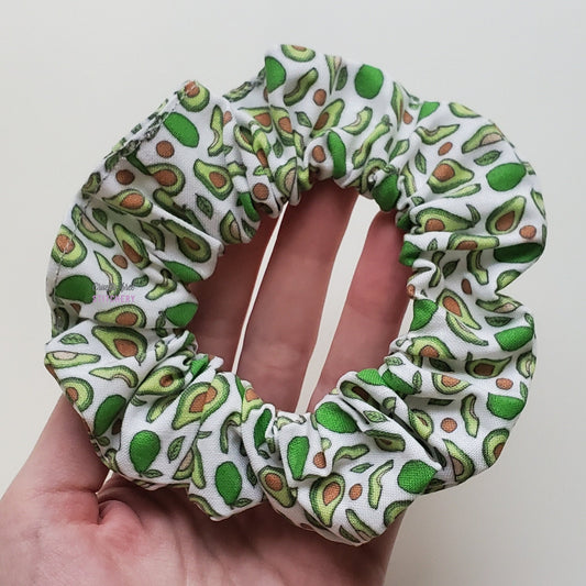 Avocado print scrunchie in my hand.