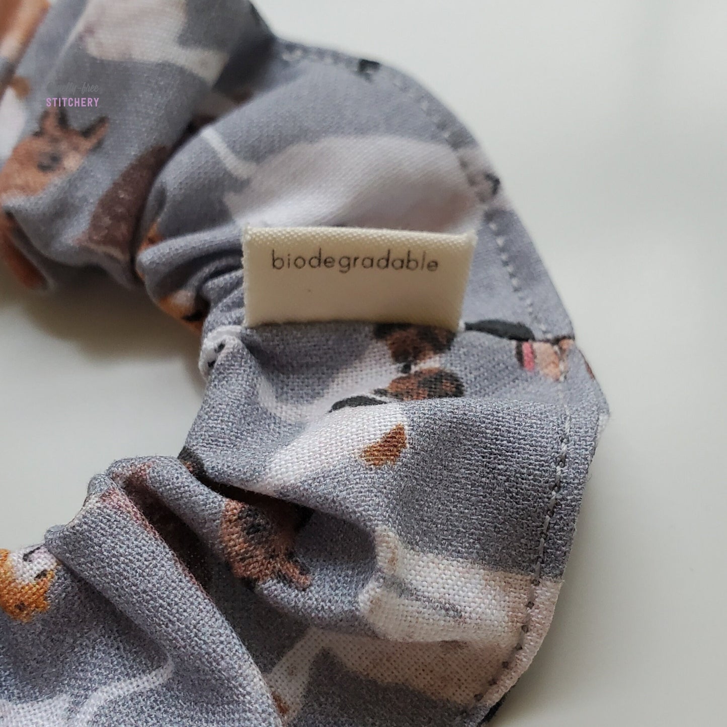 The back of the small white tag says "biodegradable"