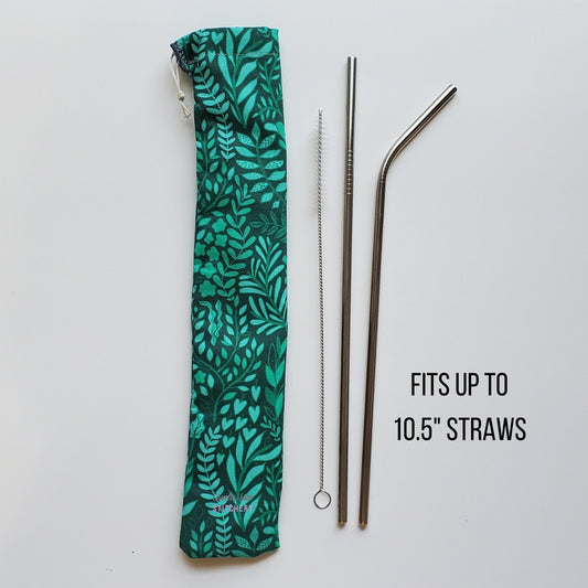 Reusable straw pouch in the same green with leaves print laying vertically next to a straw cleaner brush, a straight stainless steel straw, and a bent stainless steel straw. Text reads "fits up to 10.5 inch straws"