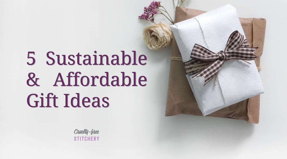 5 Sustainable and Affordable gift ideas. Purple text with minimally wrapped gifts tied with rustic brown checked ribbon and paper flowers.