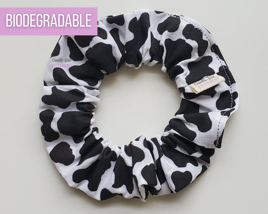 Black and white cow print scrunchie.