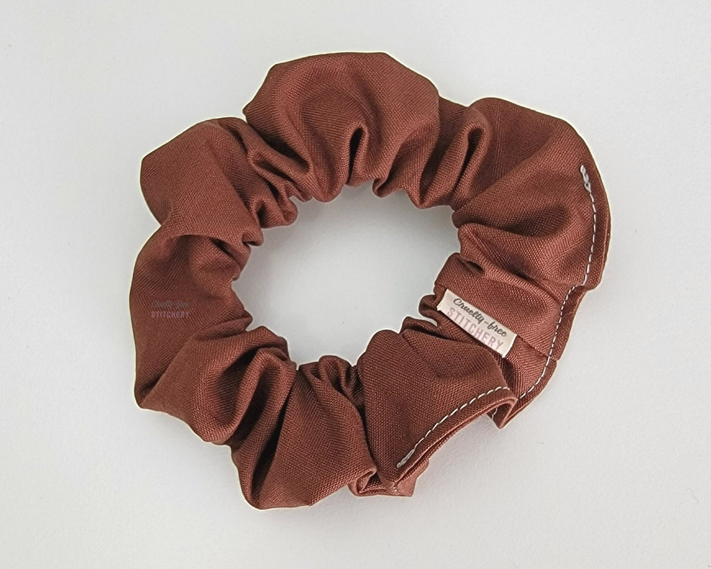 Solid chocolate brown scrunchie.